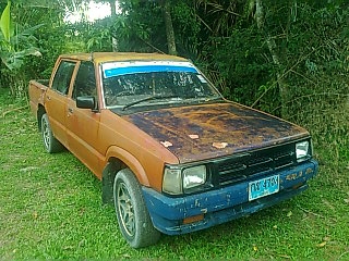 ขายรถกระบะ 4 ประตู MAZDA แม็กนั่ม ใส่เครื่อง นิสสัน LD28 6 สูบ เชื้อเพลิงดีเซล พวงมาลัยเพาเวอร์ เกียร์ธรรมดา ราคา 35000