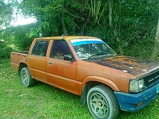 ขายรถกระบะ 4 ประตู MAZDA แม็กนั่ม ใส่เครื่อง นิสสัน LD28 6 สูบ เชื้อเพลิงดีเซล พวงมาลัยเพาเวอร์ เกียร์ธรรมดา ราคา 35000