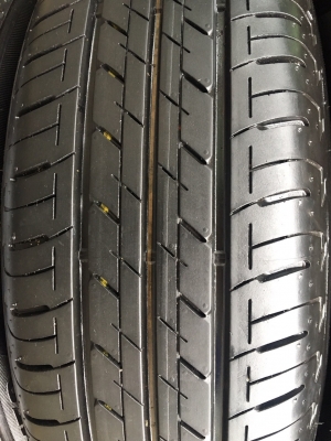 แม็ก Nissan Almera Sportech ขอบ 15 พร้อมยางป้ายแดง 185-65-15 Bridgestone ปี 17