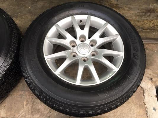 ล้อแม็ก Mitsu Pajero ก้ามปู ขอบ 17 พร้อมยาง 255-65-17 Bridgestone ปลายปี 12