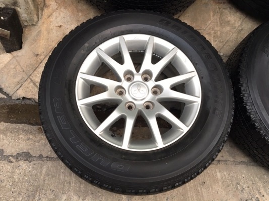 ล้อแม็ก Mitsu Pajero ก้ามปู ขอบ 17 พร้อมยาง 255-65-17 Bridgestone ปลายปี 12