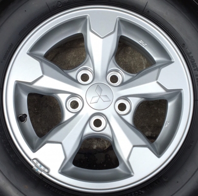 ล้อแม็กป้ายแดง Mitsu Triton ขอบ 15 พร้อมยางป้ายแดง 215-70-15 Bridgestone ปลายปี 17