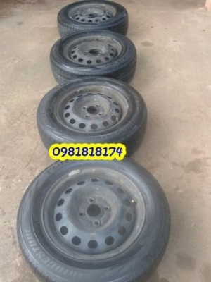 กะทะล้อ4รู100พร้อมยางบริสโตนขอบ14สวยๆ ปี12