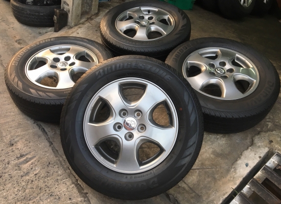 ล้อแม็ก Toyota Vigo Champ สีเทาดำ ขอบ 16 พร้อมยาง 215-65-16 ปี 14