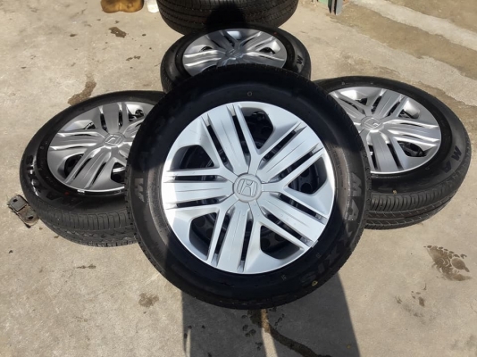 ขายล้อเหล็กป้ายแดง jazz 15" 4รู 100 พร้อมยางปี17 สนใจติดต่อร้าน ก.เจริญการยางครับ 081-3747940