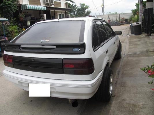 Ford Laser ขาวมุก ปี 30-32 ราคา 50000.- Ford Laser ขาวมุก ปี 30-32 ราคา 50000.-