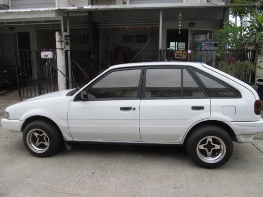 Ford Laser ขาวมุก ปี 30-32 ราคา 50000.-