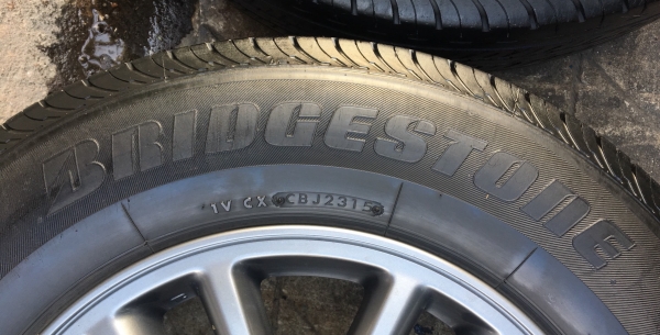 ล้อแม็ก ISUZU All New D-Max ขอบ 16 สีเทาดำ พร้อมยาง Bridgestone 215-70-16 ปี 15