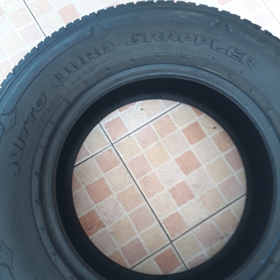 ยาง 265-65-17 NITTO DURA GRAPPLER ปี15 ดอกท่วม 1ชุด 4,500