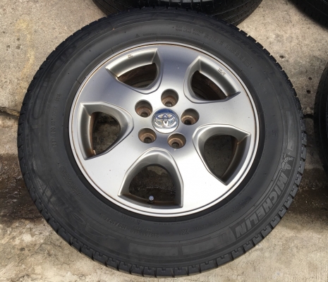 ล้อแม็ก Toyota Vigo Champ สีเทาดำ ขอบ 16 พร้อมยาง Michelin 215-65-16 ปี 14