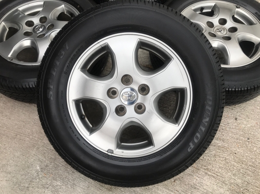 ล้อแม็ก Toyota Vigo Champ สีเทาดำ ขอบ 16 พร้อมยาง 215-65-16 Dunlop ปลายปี 16 ยางหนาปึกทุกเส้น
