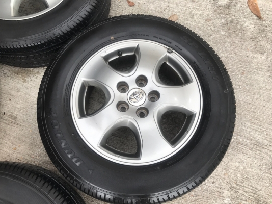 ล้อแม็ก Toyota Vigo Champ สีเทาดำ ขอบ 16 พร้อมยาง 215-65-16 Dunlop ปลายปี 16 ยางหนาปึกทุกเส้น