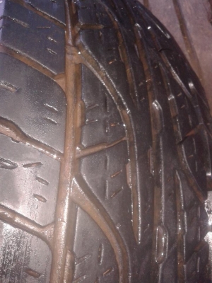 ยางขาลุยดันล็อป 30x9.5ขอบ15 ปี13 มีปะ1เส้น ไม่บวม โทร 0981818174