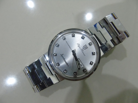 นาฬิกา Olym Pianus รุ่น Sportmaster ชาย เรือนเงิน สภาพใหม่