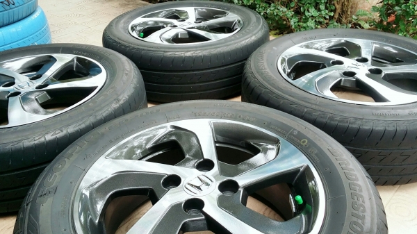 ล้อแม็กฮอนด้า ขอบ15 4รู100 พร้อมยางบริดสโตน อีโคเปีย ปี15(3115) 4ล้อ