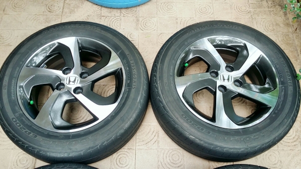 ล้อแม็กฮอนด้า ขอบ15 4รู100 พร้อมยางบริดสโตน อีโคเปีย ปี15(3115) 4ล้อ