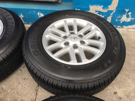 ล้อแม็กพร้อมยางป้ายแดง Toyota Fortuner BMC 265-65-17 ปลายปี 17 เส้นสีชัดๆ