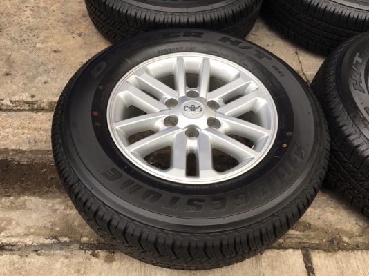 ล้อแม็กพร้อมยางป้ายแดง Toyota Fortuner BMC 265-65-17 ปลายปี 17 เส้นสีชัดๆ