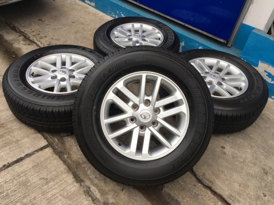 ล้อแม็กพร้อมยางป้ายแดง Toyota Fortuner BMC 265-65-17 ปลายปี 17 เส้นสีชัดๆ