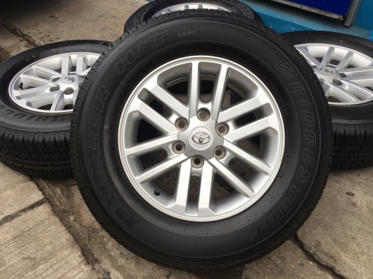 ล้อแม็กพร้อมยางป้ายแดง Toyota Fortuner BMC 265-65-17 ปลายปี 17 เส้นสีชัดๆ