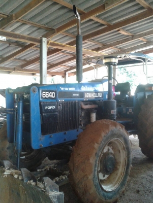 ขายรถไถ NEW HOLLAN 6640 (4WD) ปี 96 พร้อมหางสาม รถพร้อมใช้ ทะเบียนพร้อมโอน