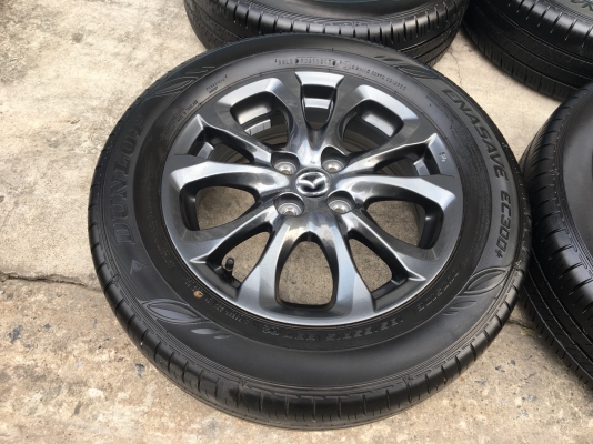 ล้อแม็กป้ายแดง Mazda 2 ขอบ 15 สีดำ มิดไนท์ พร้อมยางป้ายแดง185-65-15 ปี 17 มีตุ่ม เส้นสี