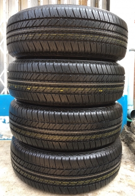 ยางป้ายแดง Bridgestone 265-65-17 ปลายปี 17 ตุ่มเป้งๆ เส้นสีชัดๆ