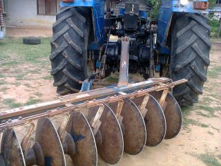 รถไถฟอร์ด AT 2 เพลา ขับนิวฮอแลนด์  เอกสารทะเบียนพร้อม  อุปกรณ์มีชุดหน้าและฐานหลัง