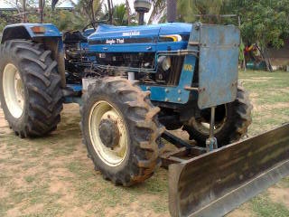 รถไถฟอร์ด AT 2 เพลา ขับนิวฮอแลนด์  เอกสารทะเบียนพร้อม  อุปกรณ์มีชุดหน้าและฐานหลัง