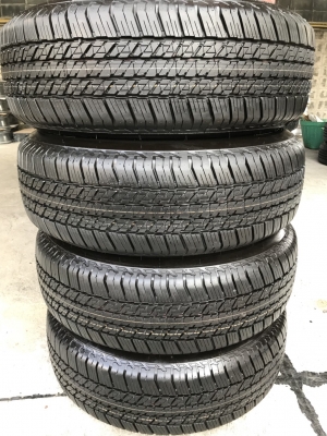 ยางใหม่ป้ายแดง 245-65-17 Bridgestone ตุ่มเด้งๆ เส้นสีชัดทุกเส้น