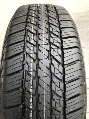ยางใหม่ป้ายแดง 245-65-17 Bridgestone ตุ่มเด้งๆ เส้นสีชัดทุกเส้น