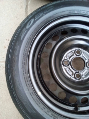 ขายล้อ อะไหล่พร้อมยาง กะทะล้อขนาด 4 รู 100 mm. ขอบ 15 เบอรฺ์ 185/60R15 โทร.081-427-3941
