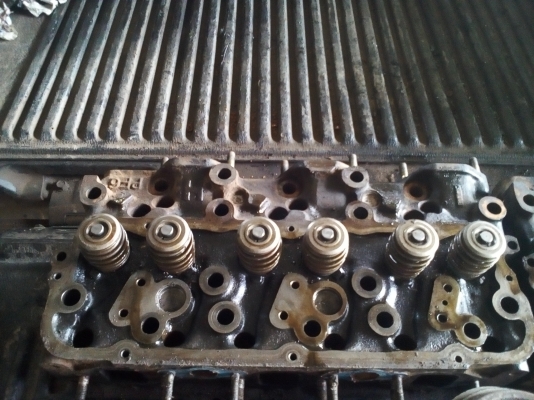 ขายฝาสูบและลูกสูบแท้นอกของUD ใส่PF6 ราคา 30000 บาท