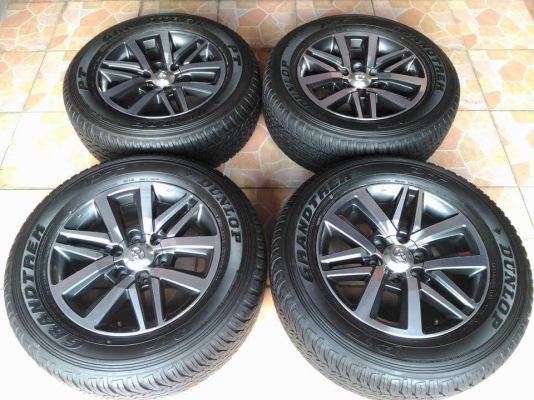 ล้อแม็ก New Fortuner ขอบ 18(6/139) พร้อมยาง Dunlop Grandtrek PT 265 60 18  สภาพพร้อมใช้ ขายถูกๆ ทั้งชุด 16900.-พร้อมน็อตแท้ 1 ชุด *** เทิร์นได้ ใส่ฟรี รับบัตรเครดิตทุกธนาคาร ส่งทั่วไทย