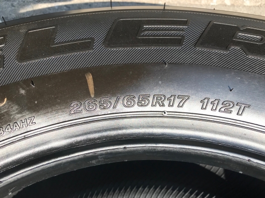 ยางใหม่ป้ายแดง Bridgestone 265-65-17 ปี 18 ตุ่มเป้งๆ เส้นสีจัดๆ ยางใหม่ป้ายแดง Bridgestone 265-65-17 ปี 18 ตุ่มเป้งๆ เส้นสีจัดๆ