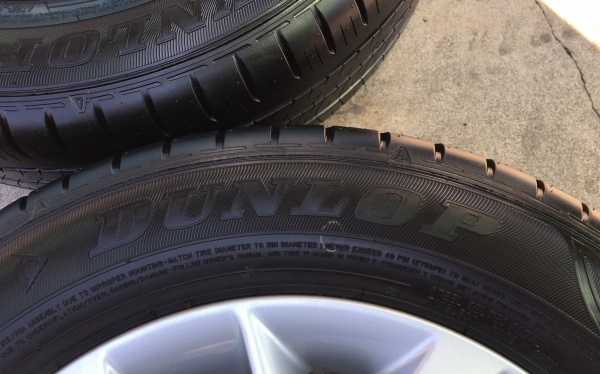 ล้อแม็กป้ายแดง Nissan 4รู100 ขอบ 15 พร้อมยางป้ายแดง Dunlop 185-65-15