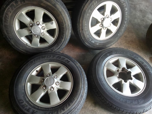 ล้อเดิมอีซูซุ16&times;7+ยาง265/70/16 มีร่องลอยตามการใช้งาน  ขายตามสภาพ ชุด2500บ.โทร0879050181จัดส่งได้ทั่วไทย