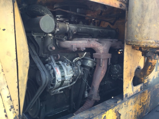 รถตักล้อยาง KOMATSU  รุ่น JH-60 ระบบเลี้ยวล้อหลัง เป็นรถ 2 เพลา