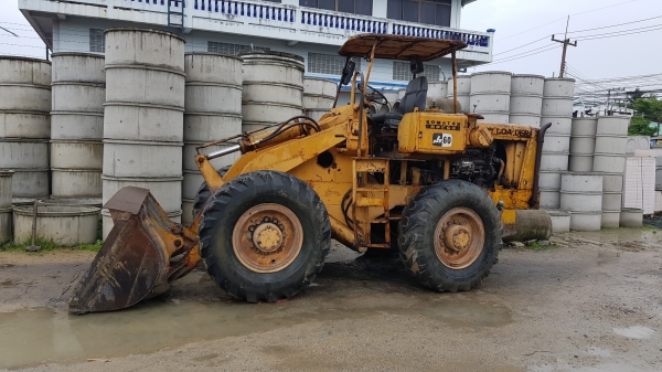 รถตักล้อยาง KOMATSU  รุ่น JH-60 ระบบเลี้ยวล้อหลัง เป็นรถ 2 เพลา