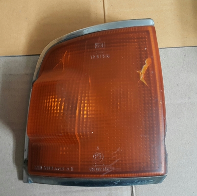 โคมไฟหน้าพร้อมเสื้อไฟเลี้ยว ข้างขวา ของ อีซุซุ มังกร