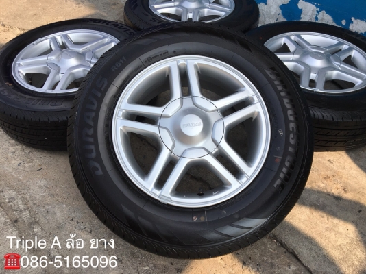 ล้อแม็กพร้อมยางป้ายแดง ISUZU Blue Power (ลายดาว) ขอบ16 Bridgestone 215-70-16 ปี 18 ตุ่มอลัง เส้นสีชัดๆ