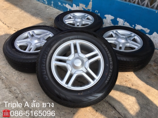 ล้อแม็กพร้อมยางป้ายแดง ISUZU Blue Power (ลายดาว) ขอบ16 Bridgestone 215-70-16 ปี 18 ตุ่มอลัง เส้นสีชัดๆ