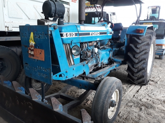 ขายรถไถฟอด6610เพลาเดียวเสื้อลายปั้มกลมอุปกรณ์บ้านโป้งราคาต่อรอง