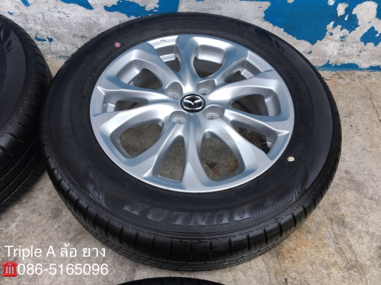 ล้อแม็กป้ายแดง Mazda 2 ขอบ 15 สีบอร์น พร้อมยางป้ายแดง Dunlop 185-65-15 ปลายปี 17  แม็กสวย ดอกเต็ม มีตุ่ม
