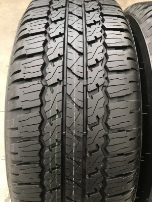 ยางป้ายแดง Bridgestone 265-65-17 ปี 18 ตุ่มเด้งๆ เส้นสีชัด
