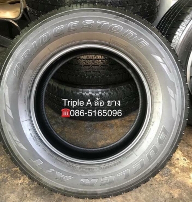 ยางป้ายแดง Bridgestone 265-65-17 ปี 18 ตุ่มเด้งๆ เส้นสีชัด ยางป้ายแดง Bridgestone 265-65-17 ปี 18 ตุ่มเด้งๆ เส้นสีชัด