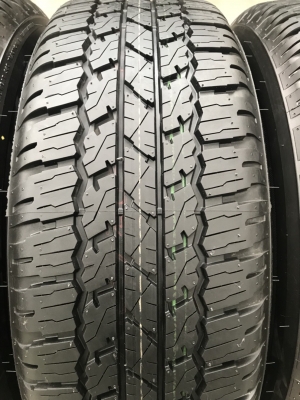ยางป้ายแดง Bridgestone 265-65-17 ปี 18 ตุ่มเด้งๆ เส้นสีชัด