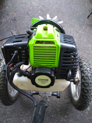 เครื่องตัดหญ้าแบบเข็นมีล้อ