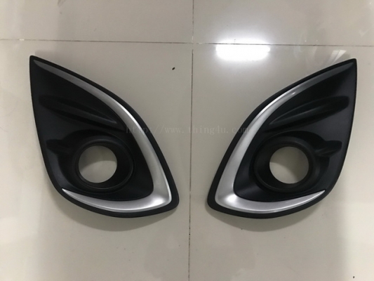 ฝาครอบไฟตัดหมอก Mazda2 แท้