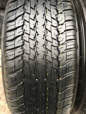 ยางป้ายแดง 265-65-17 Dunlop ปี 18 ตุ่มอลัง เส้นสีชัด ยางป้ายแดง 265-65-17 Dunlop ปี 18 ตุ่มอลัง เส้นสีชัด
